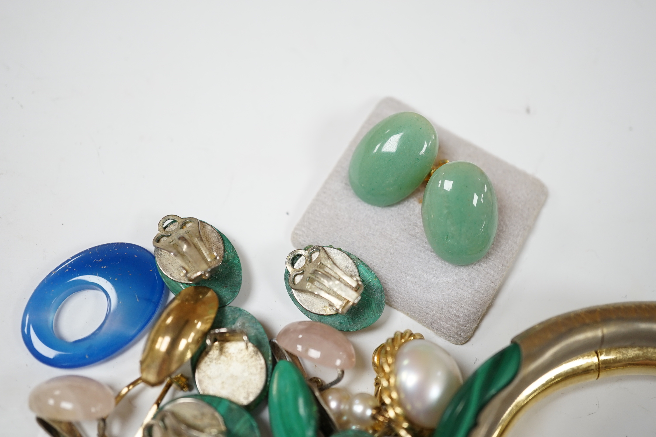 A pair of 14k and three stone cultured pearl set drop ear clips, 23mm, a pair of 18k and single stone cultured pearl set ear clips, a quantity of assorted costume ear clips and two bangles etc.